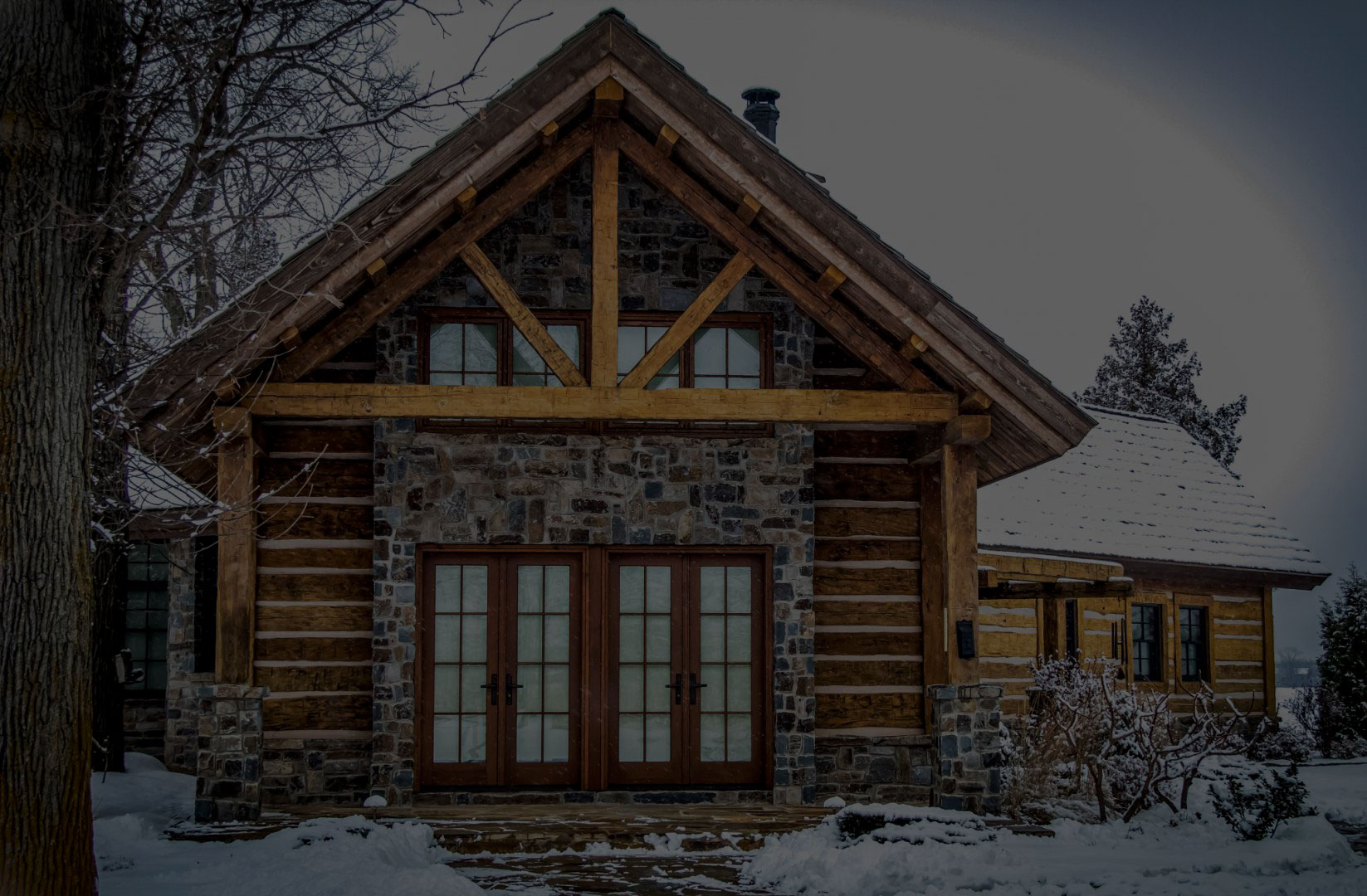 Cabin exterior featuring vintage reclaimed lumber construction.